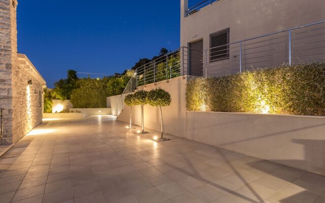 Beachfront Villa Poseidon with Heated Pool