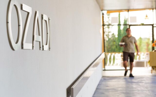 Ozadi Tavira Hotel