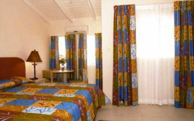 Tropical Winds Apartment Hotel