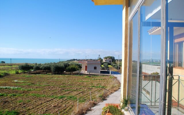 Apartment with 2 Bedrooms in Porto Palo, with Wonderful Sea View And Furnished Terrace