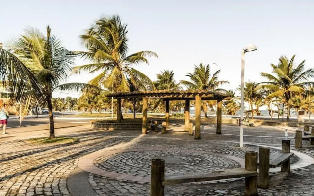 Flat na Praia de Itapuã no Térreo com AR-Condicionado - SEM TAXAS