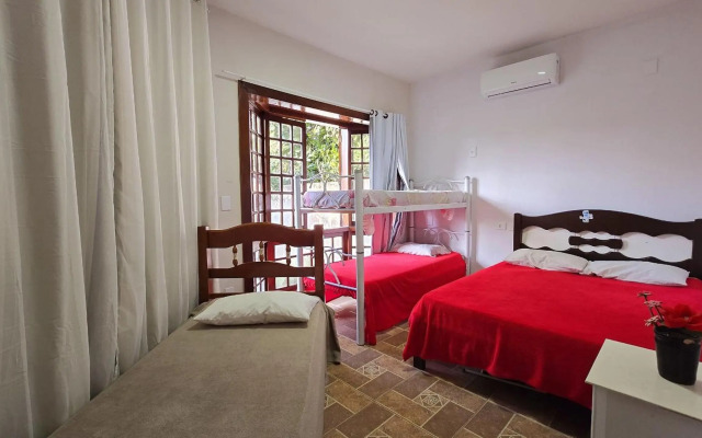 Casa Toscana 4 suítes, piscina e churrasqueira