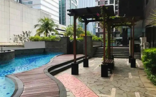 Tidy and Good Deal Studio at Tamansari Semanggi Apartment By Travelio – Pool – Jakarta