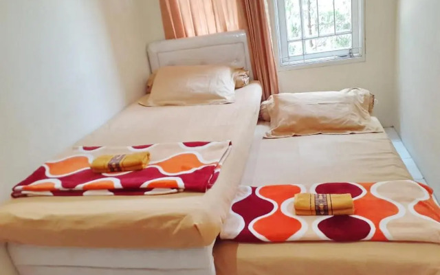 Spot On 3988 Kost Carmelia Baranangsiang Syariah