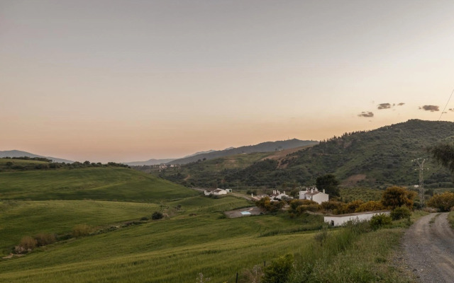 Casa Grande / Rosas Cantares