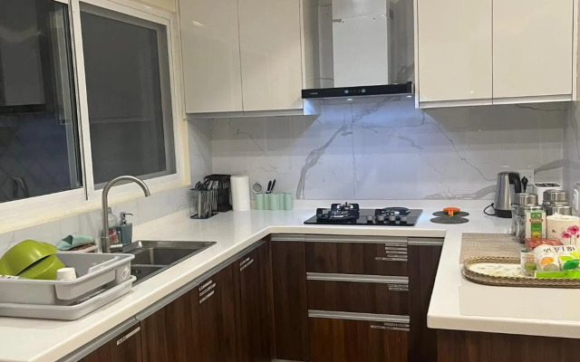 Elysium Service Apartment 1203