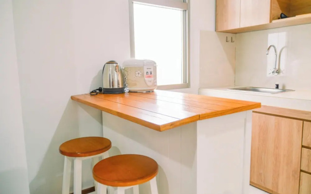 Chic and Cozy 2BR Apartment at Springwood Residence