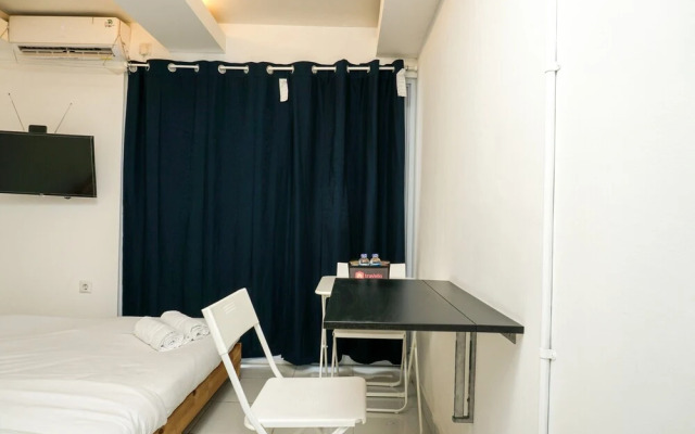 Simply White and Compact Studio at Amethyst Apartment