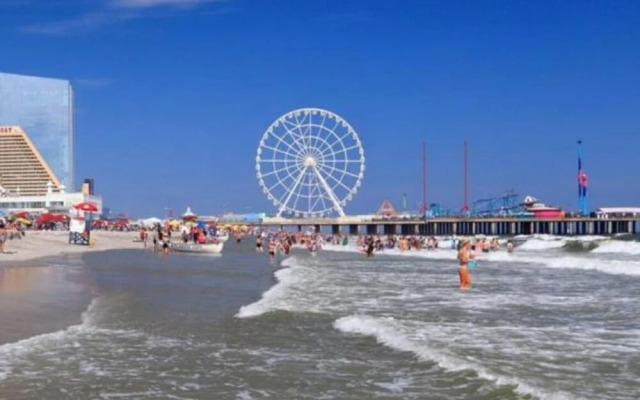 Boardwalk 2BR 3BA Condo by CozySuites
