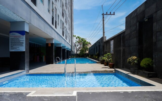 Homey And Tidy 2Br At Puri Mas Apartment