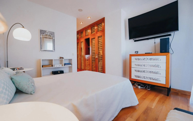 Villa con piscina a pie de playa