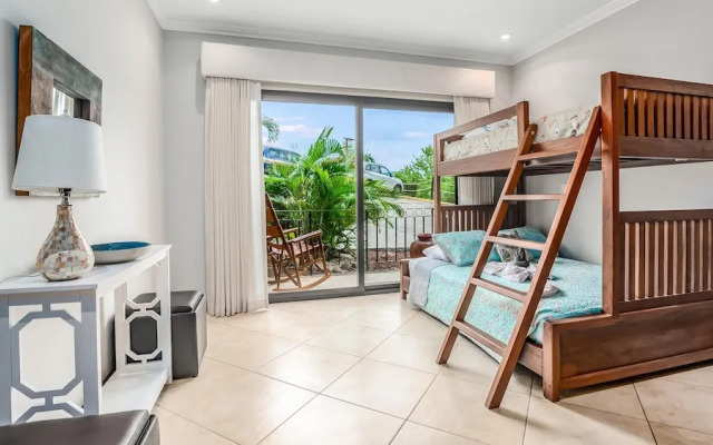 Elegant Oceanview Condo with Spacious Open-Concept Floor Plan and Inviting Beach Design