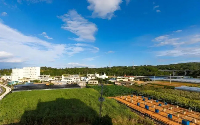 Mr.KINJO in front of Manza Beach