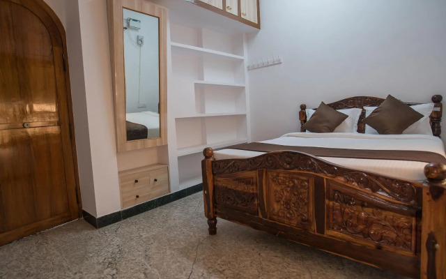 OYO 78180 2BHK Compact Home Near Promenade Beach