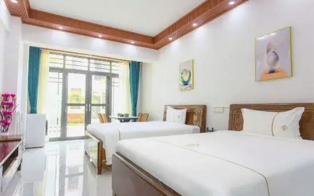 Jizhu Holiday Apartment (Menghai Mengbala Store)