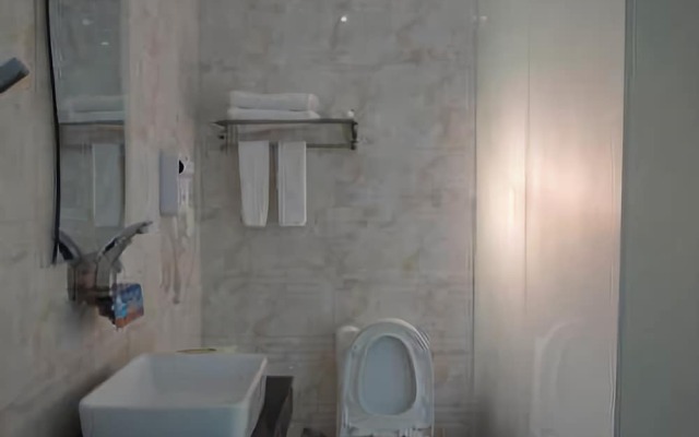 Lecheng Business Hotel