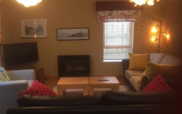 Secluded ground floor village centre apartment