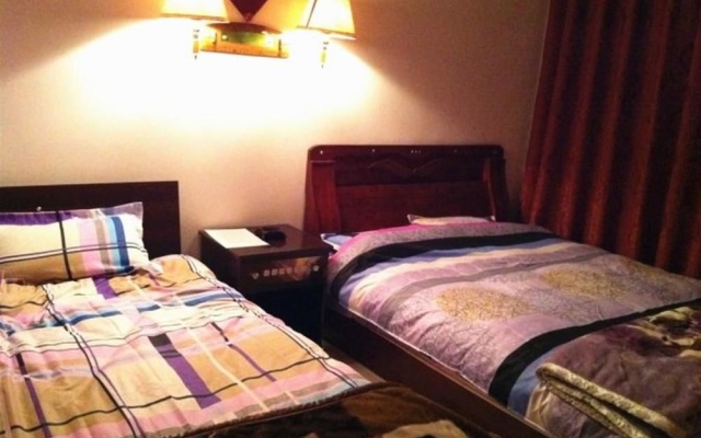Lijiang Courtyard Inn – Guest Rooms – Lijiang