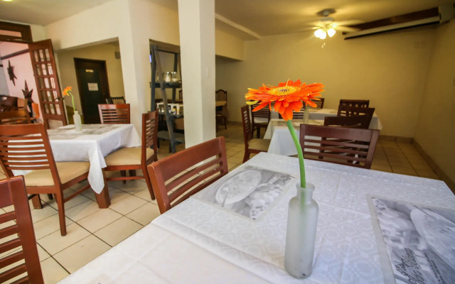 Capital O Hotel Casa Blanca