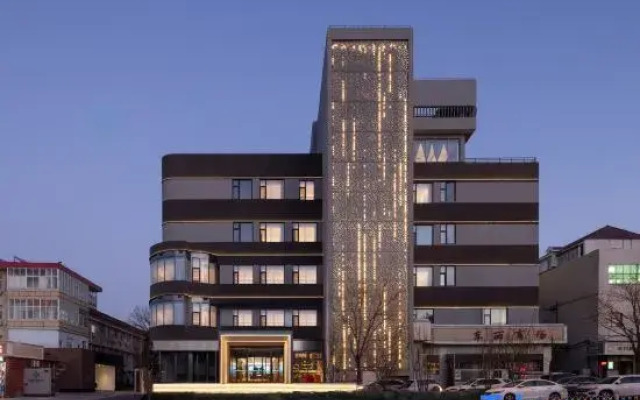 Pujing Waiting Hotel (Dongli Plaza Zhangguizhuang Subway Station)