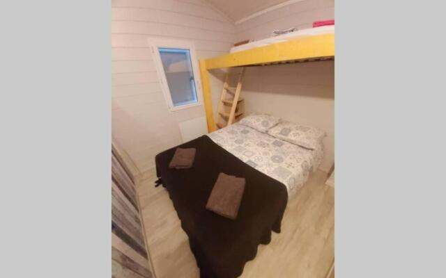 Chalet T3/clim/wifi/pkg/terrasse/15 min plages