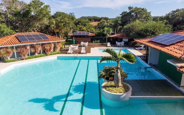 Bz10 Casa 4 suítes em condomínio clube