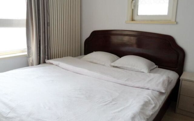 Dalian Jiujiuyuan Apartment Hotel