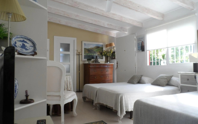 Casa con jardín frente Playa de Burriana