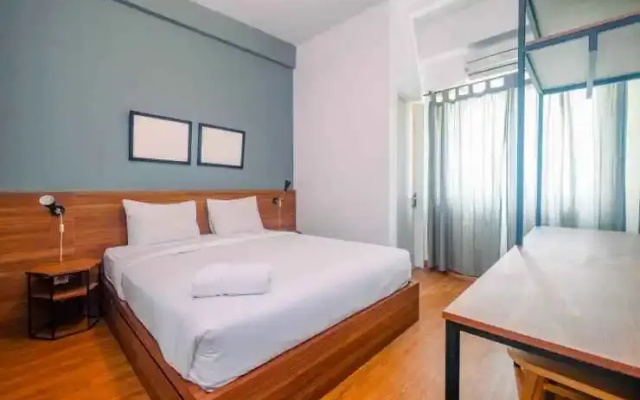 Modern 1BR at Margonda Residence 1 Apartment By Travelio