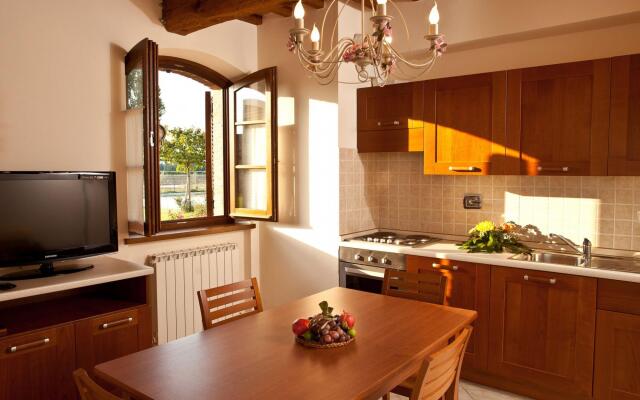 An agritourism complex with views of Assisi.