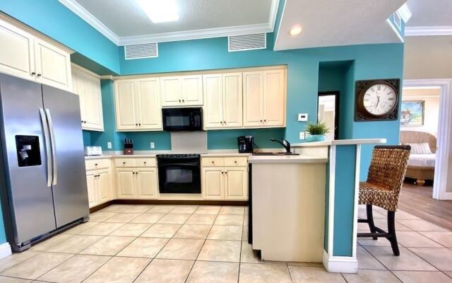 Wonderful Tropical Condo with Beach and Fitness Center Access - Unit 0102 by RedAwning