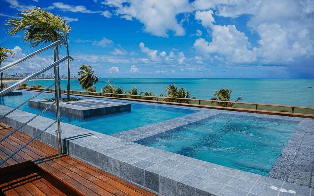 Unity #420 - Apartamento beira mar por Carpediem