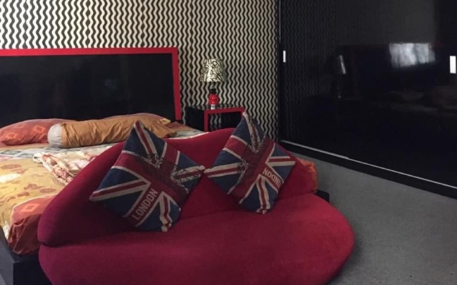 The Suites Metro Ananda Home