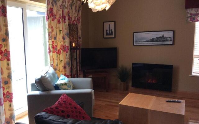 Secluded ground floor village centre apartment