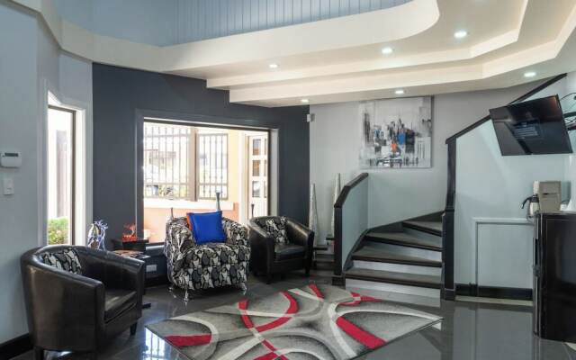 Prado Inn & Suites