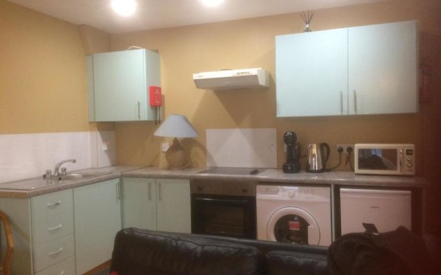 Secluded ground floor village centre apartment
