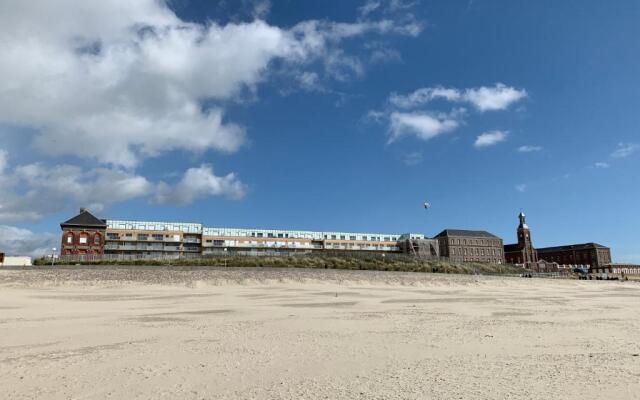 Face mer pieds dans l'eau