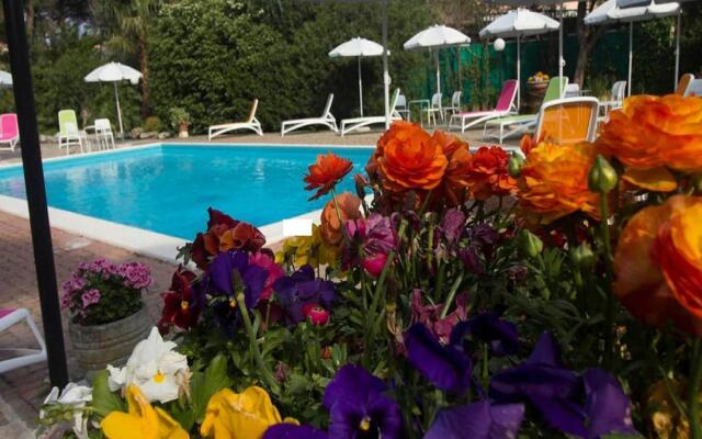 Snug holiday home in Loano with shared pool
