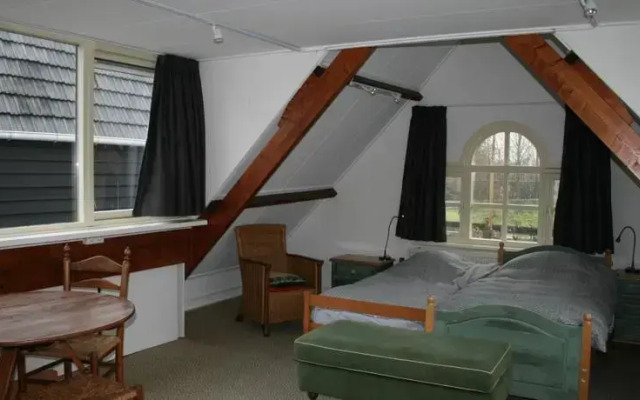 Holiday home Koetshuis de Polderruimte