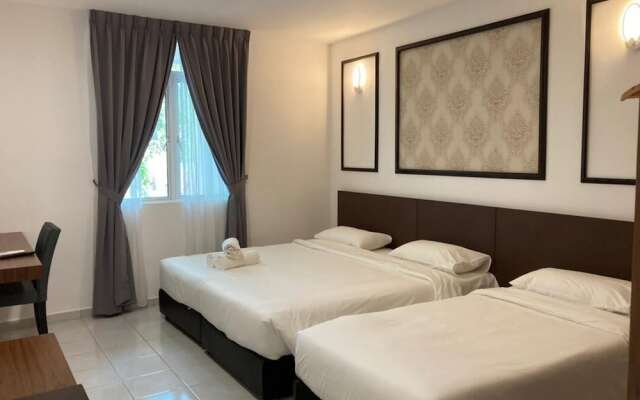 Cafe & Capital O 90756 Cara Hulu Hotel