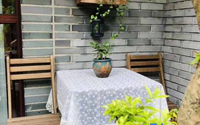 Zhangshe Courtyard Hotel