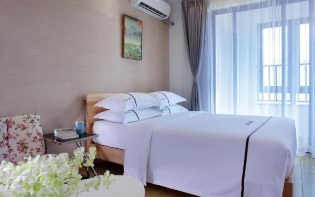Green Collection Care Hotel (24 Hours Free Transfer from Meilan Airport/Railway Station)