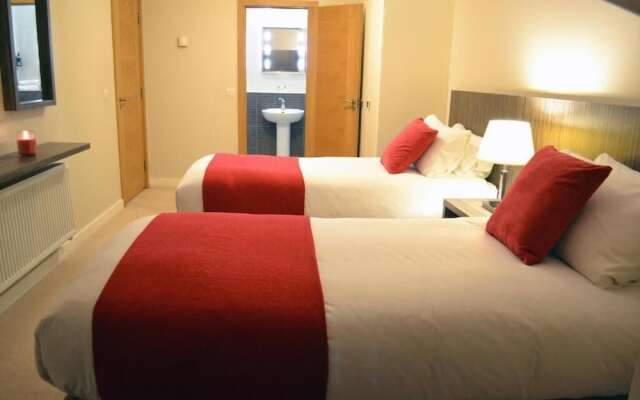 Carrick Plaza Suites & Apartments