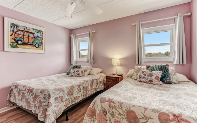Oceanfront Beach Condo with Private Balcony, Short Walk to Pool and Beach by RedAwning