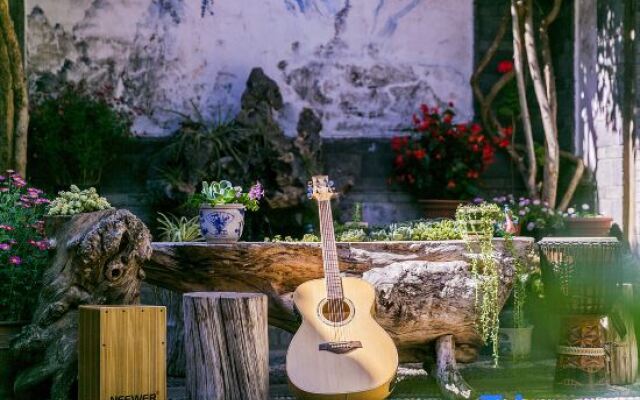 Wu Suo · Li Ziyuan (Lijiang Old Town Mufu Hotel)