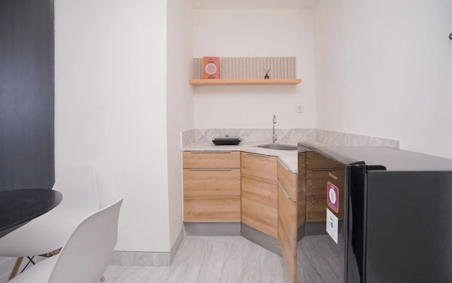 Good and Cozy 2BR at Collins Boulevard Apartment