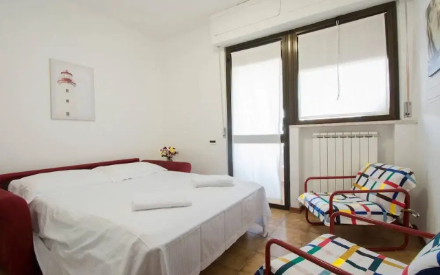 ALTIDO Lovely 1BR flat with patio and parking