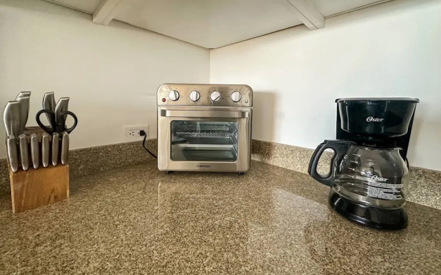 Steps to Sandy Beach Pool Renovated 2BR Condo