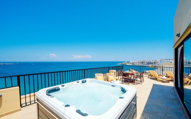 Islet Seafront Penthouse with Hot tub