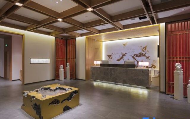 QIANNA HOTEL (Xinxiang Hualan Avenue Pangdonglai Shopping Plaza)